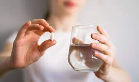 Drink the capsules with clean water